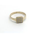 An 18carat gold ring set with a pattern of diamond