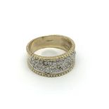 A 9carat gold ring set with a pattern of diamonds.