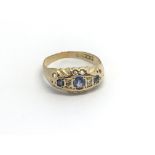 An 18carat Gold Edwardian ring set with three blue