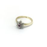 An 18carat gold ring set with a ruby and brilliant