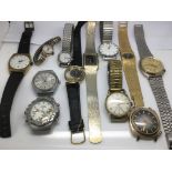 A tin of approx 25 watches.