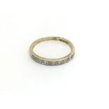 A 9carat gold half hoop eternity ring size N