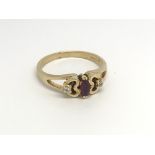 An 18carat gold ring set with a Marquis cut ruby f