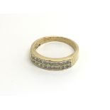 A Quality 18carat gold ring set with two rows of d