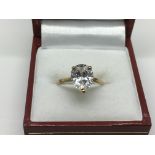 Another 9ct gold ring set with a large pear shaped