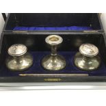 A cased silver writing set comprising a pair of in
