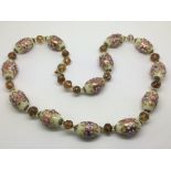 A decorative restrung Venetian bead necklace.