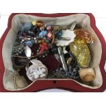 A jewellery box containing a small collection of c