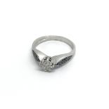 A 9carat white gold ring set a solitaire diamond t