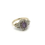 A 9carat gold ring set with an Amethyst and small