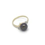 A 18ct yellow gold, diamond and black pearl ring,