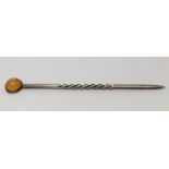 A Liberty & Co. hallmarked silver stick pin set wi