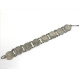 An Edwardian silver coin bracelet