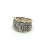 A 9carat gold ring set with four rows of diamonds