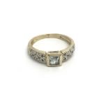 A 9carat gold ring setvwith an aquamarine coloured