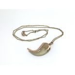 A 9ct Victorian claw pendant on 9ct chain, approx