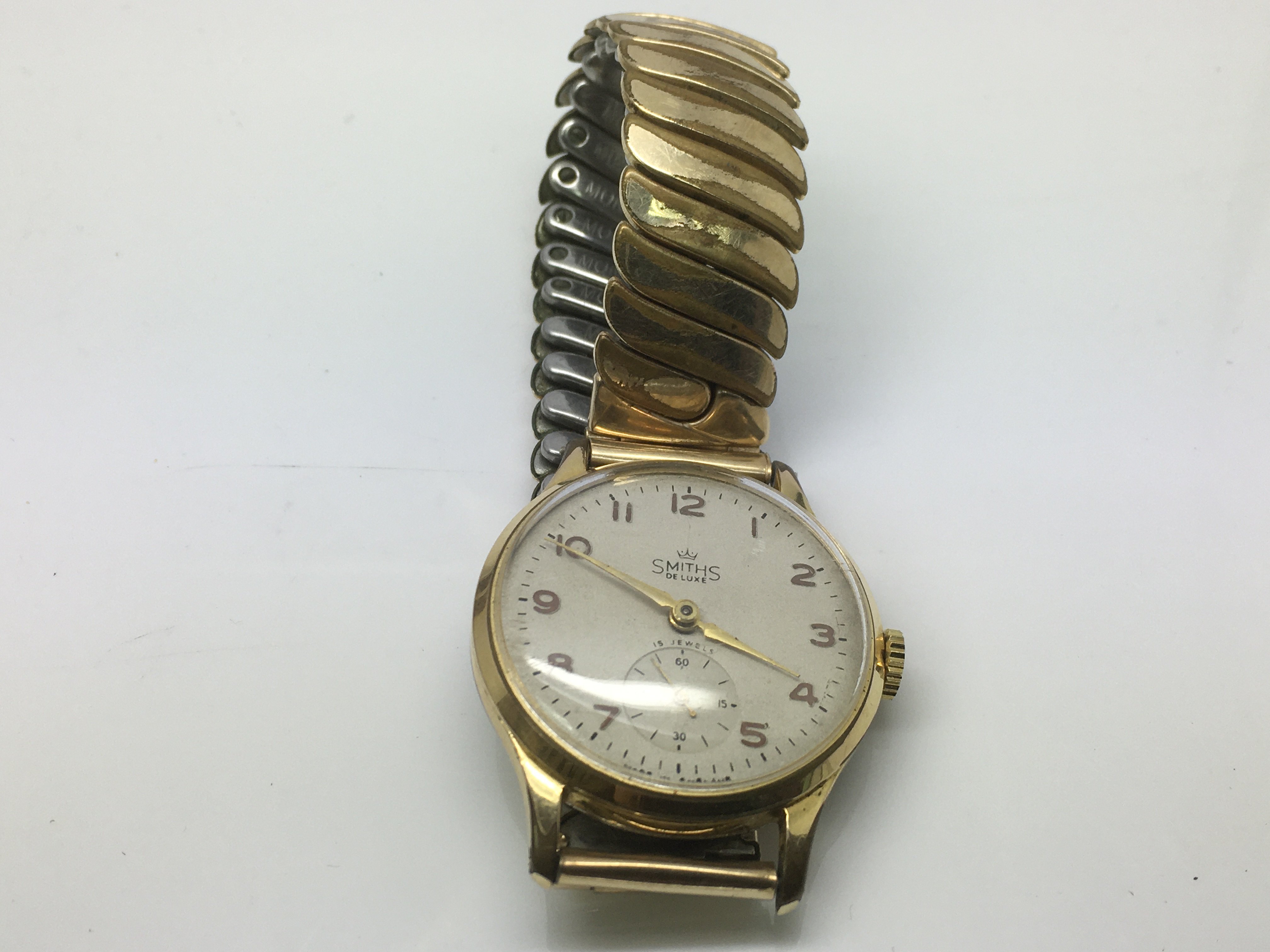 A Smiths De Luxe gold tone wristwatch with Arabic