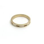 An 18carat gold ring of modern design set with pri