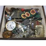 A small box of costume jewellery and other items.