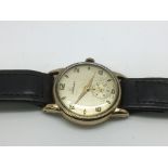 A 9ct gold Garrard watch in a Garrard box, not eng