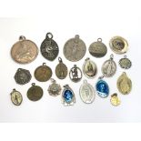 A collection of 20 Catholic religious pendants