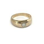 A Gents 9carat gold ring set with a brilliant cut