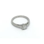 A 9ct white gold solitaire diamond ring, approx .2