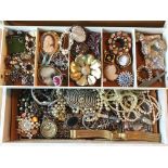 A box containing a collection of costume jewellery