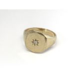 A Gents 9carat gold signet type ring set with a di
