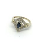 A 9carat gold ring set with a blue sapphire, the s