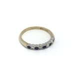 A 9carat gold half hoop eternity ring set with alt