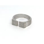 An 18ct white gold and diamond set Omega ring. (M)