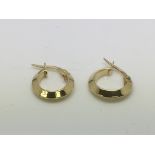 A pair of 14ct gold earrings, approx 1g.
