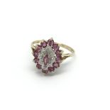 A 9carat gold ruby and diamond cluster ring ring S