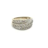 A 9ct gold 3 row diamond ring, (M), 5.7g.