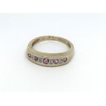 A 9carat gold ring set with pink sapphire and diam