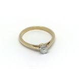 An 18ct 0.20ct solitaire diamond ring, (O), 2.6g.