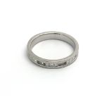 An 18carat white gold ring of modern design set wi