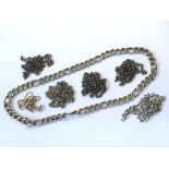 A collection of seven silver necklace chains, appr
