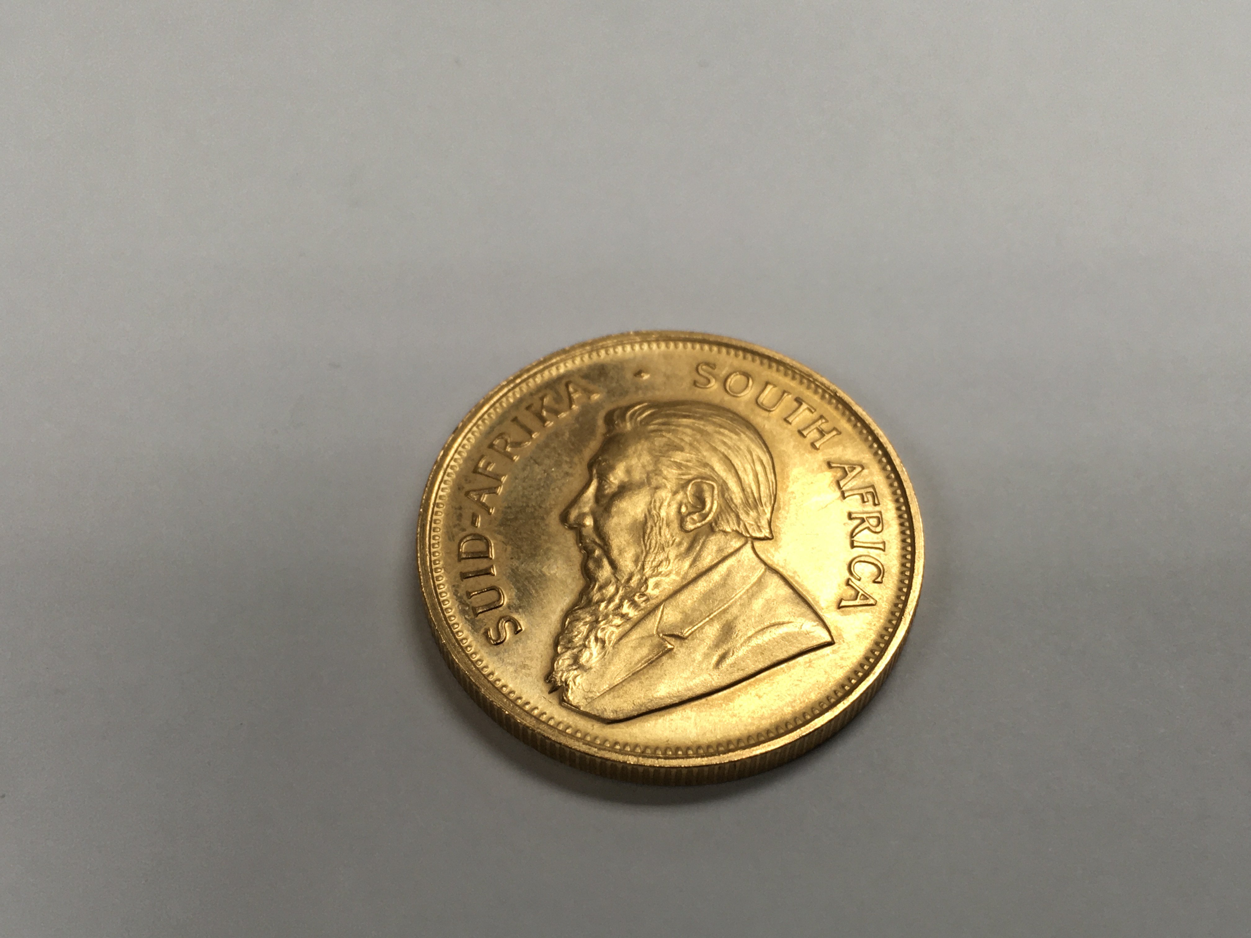 A 1974 1 oz gold krugerrand. - Image 2 of 2