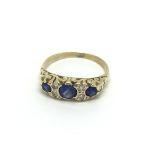 An 18carat Gold blue sapphire and diamond ring siz