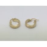 A pair of 14ct gold earrings with Greek key patter