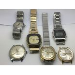 A bag of six vintage watches.