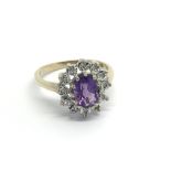 A 9carat gold amethyst and diamond ring size M-N