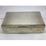 A silver cigar box with engine turned decoration t