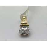 A 9ct gold pendant set with a CZ, approx 1.1g.