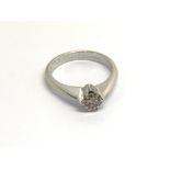An 18carat white gold solitaire diamond ring with