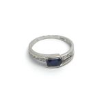 A 9carat white gold ring set with a blue sapphire