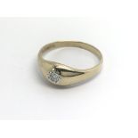 A 9carat gold gypsy type ring set with a solitaire