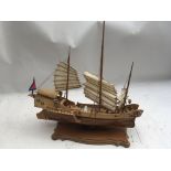 A wooden model kit of a Chinese Junk , Red Dragon,